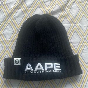 The brand is AAPE by a bathing ape the size is 32